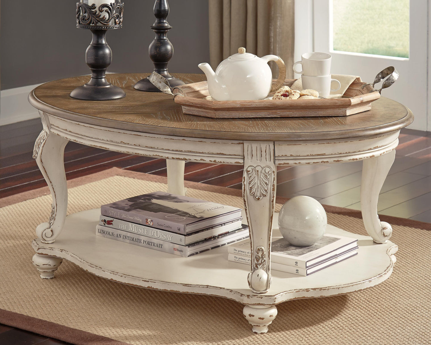 Realyn Coffee Table in white and brown with antiqued two-tone finish